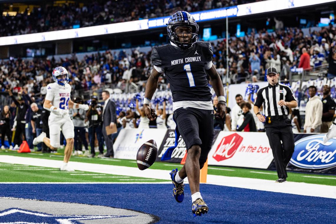 North Crowley running back Cornelius Warren III (1) runs the ball in for a touchdown in the second half of the UIL 6A Division I state championship game against Austin Westlake at AT&T Stadium in Arlington on Saturday, Dec. 21, 2024.