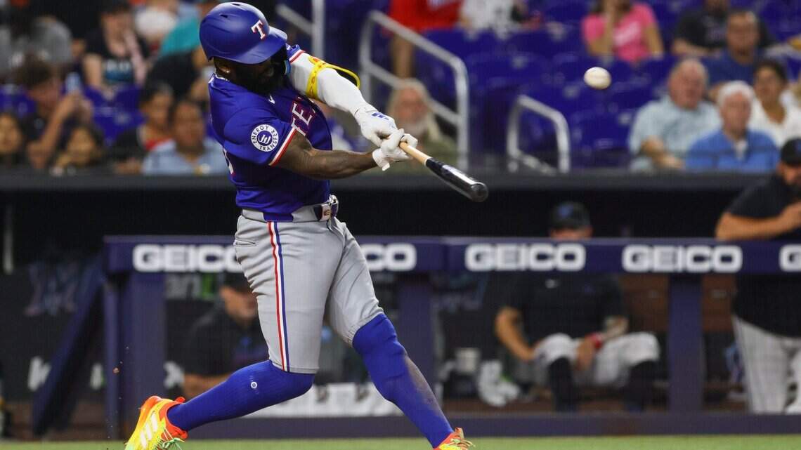 What injury has sidelined Texas Rangers outfielder Adolis Garcia?