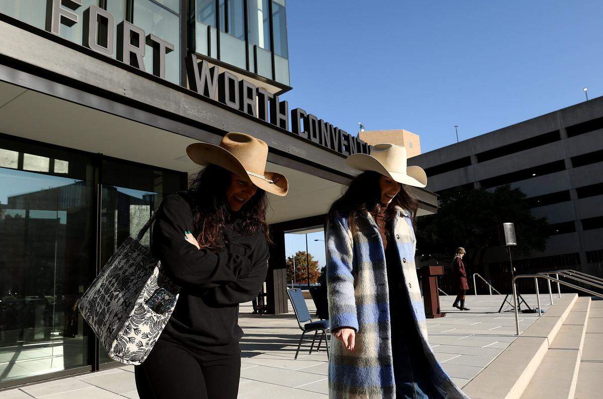 Guests descend the steps of the Fort Worth Convention Center's new southeast entrance to attend the ribbon cutting ceremony marking the completion of the Phase 1 expansion on Monday, Dec. 8, 2025, in downtown Fort Worth.