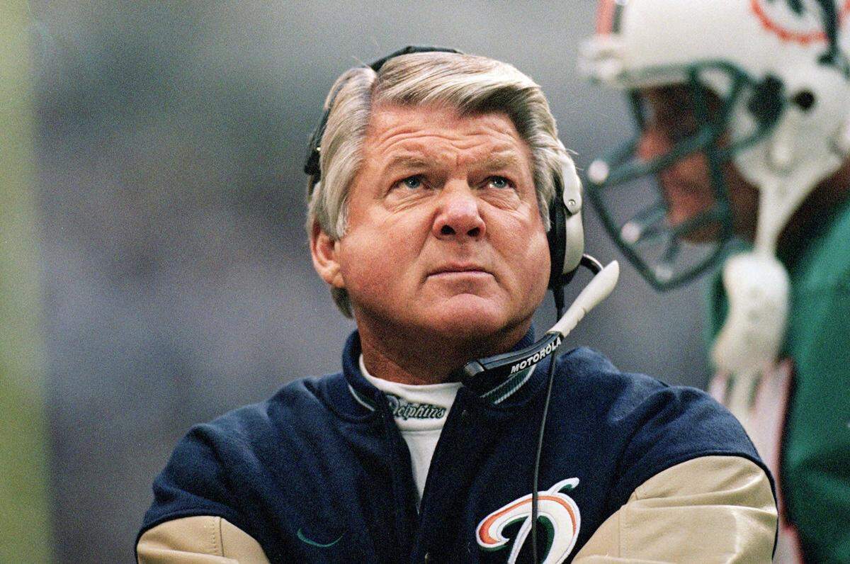 25 Nov 1999:  Head coach Jimmy Johnson  of the Miami Dolphins looks at the scoreboard during the game against the Dallas Cowboys  at the Texas Stadium in Irving, Texas. The Cowboys defeated the Dolphins 20-3. Mandatory Credit: Ronald Martinez  /Allsport-SPECIALINSTR-XASA