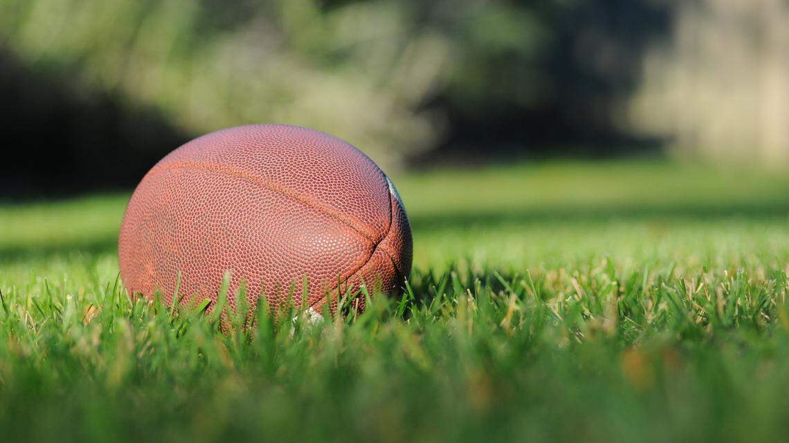 A former high school football coach in Texas is charged after female students accused him of touching them, officials said.