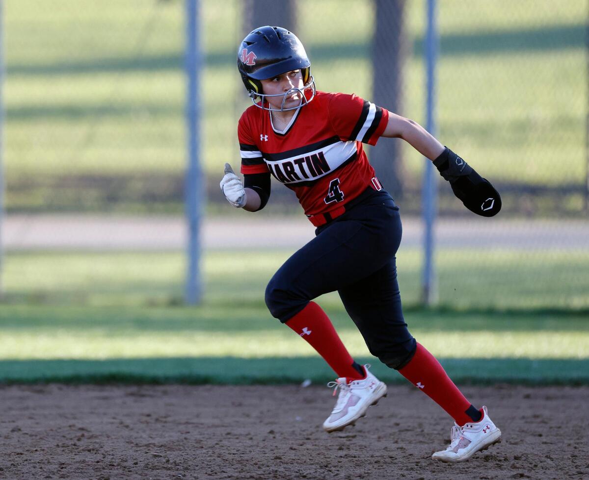 Arlington Martin short stop (4) Izabella Martinez nearly retired from high school softball.
