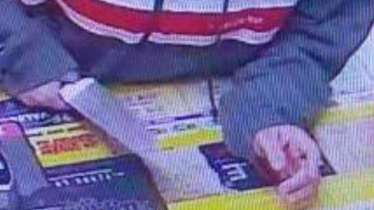 The Haltom City Police Department released a photo of the suspect wielding a knife at the counter of the PDQ gas station located in the 4600 block of Denton Highway on Saturday, Nov. 11.