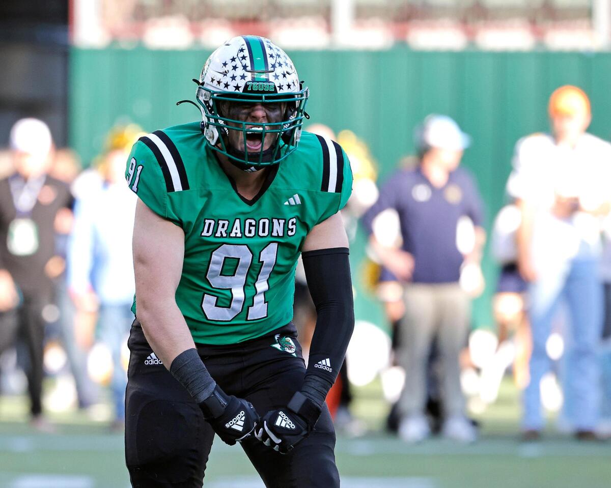 Carroll defensive lineman Chex Schirripa (91) reacts after sacking the Highland Park quarterback in the first half of a UIL Conference 6A Division 2 region football playoff game at Choctaw Stadium in Arlington, Texas, Friday, Nov. 24, 2023.