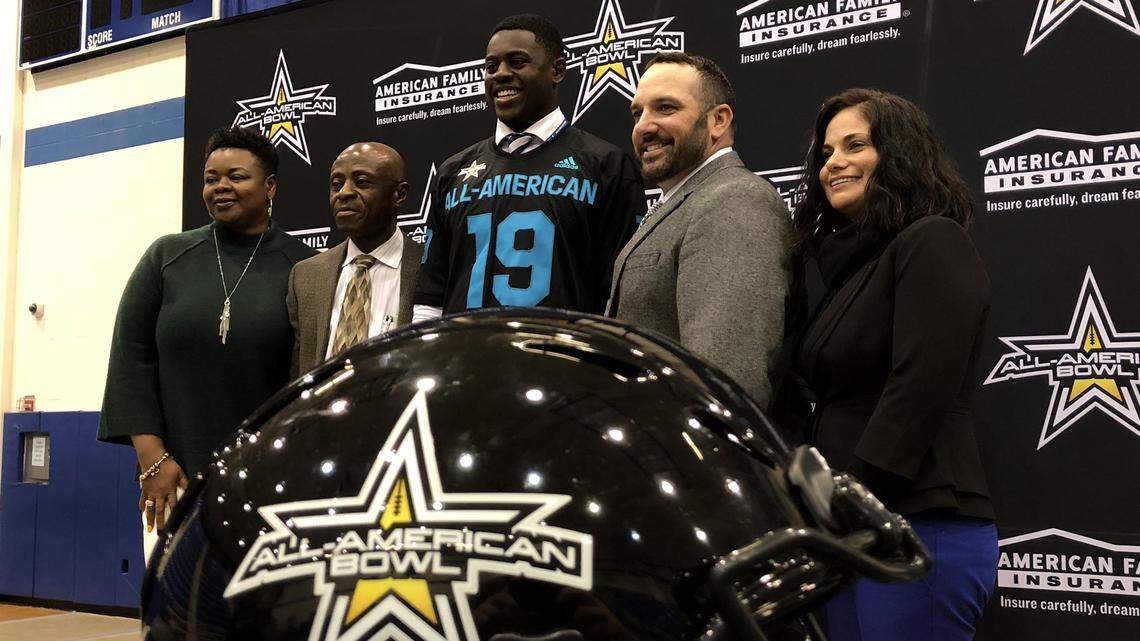 Nolan Catholic senior NaNa Osafo-Mensah receives his All-American jersey, Thursday Nov. 15, 2018