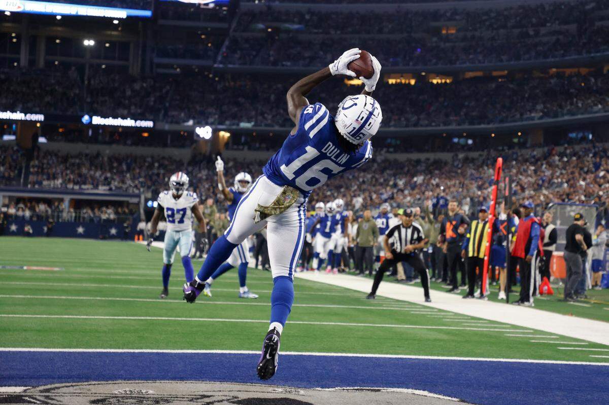Indianapolis Colts’ Ashton Dulin (16) makes a touchdown catch during the first half on Sunday against the Dallas Cowboys at AT&T Stadium.