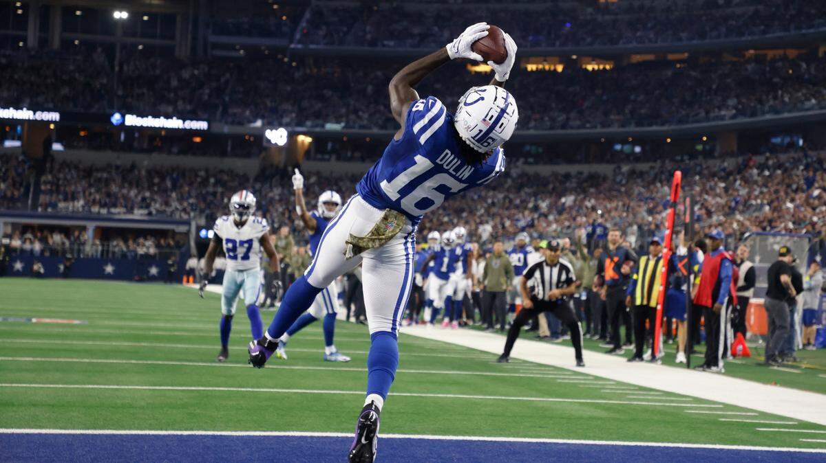 Indianapolis Colts’ Ashton Dulin (16) makes a touchdown catch during the first half of an NFL football game against the Dallas Cowboys, Sunday, Dec. 4, 2022, in Arlington, Texas. (AP Photo/Michael Ainsworth)