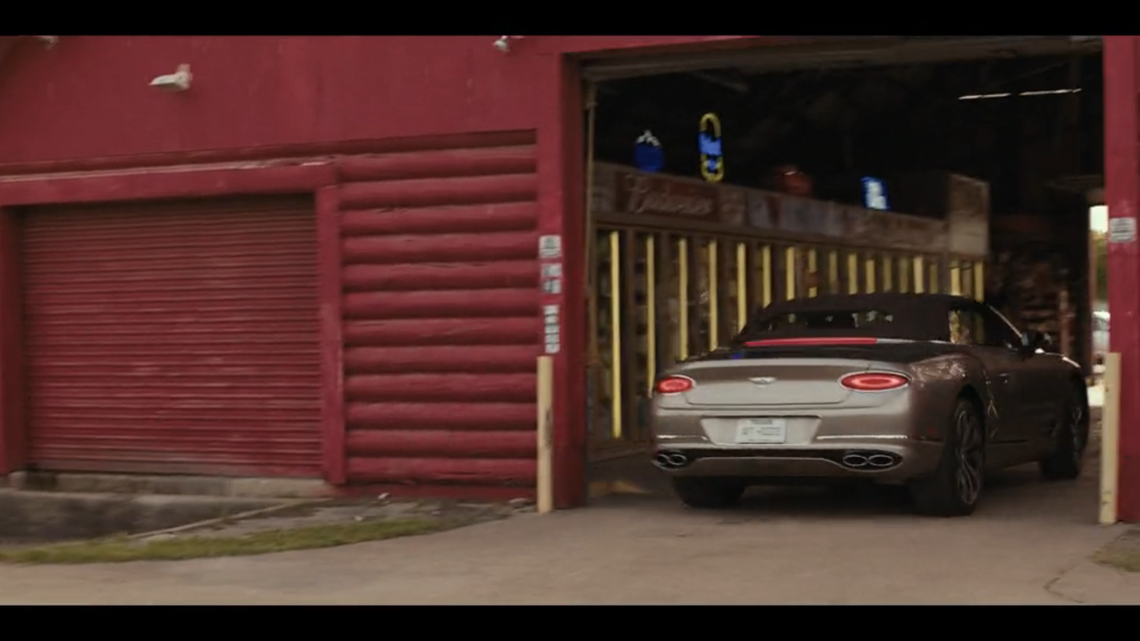 Angela (Ali Larter) stops by a drive-thru liquor store in “Landman” episode 7.