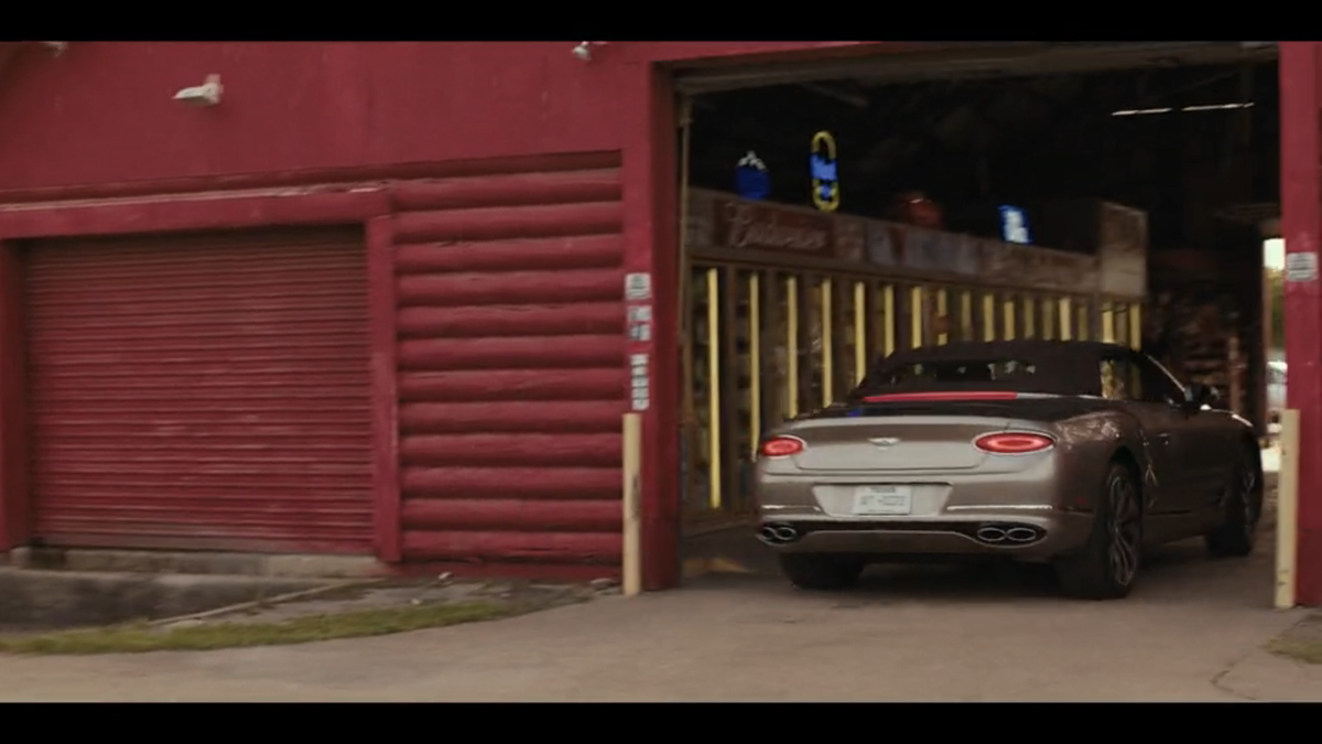 Angela (Ali Larter) stops by a drive-thru liquor store in “Landman” episode 7.