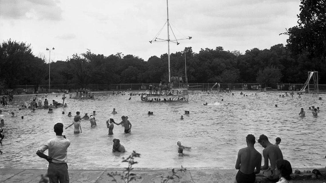 The original Forest Park Pool, pictured on the Fourth of July in 1941, was a giant circular pool with a diving platform in the middle.  