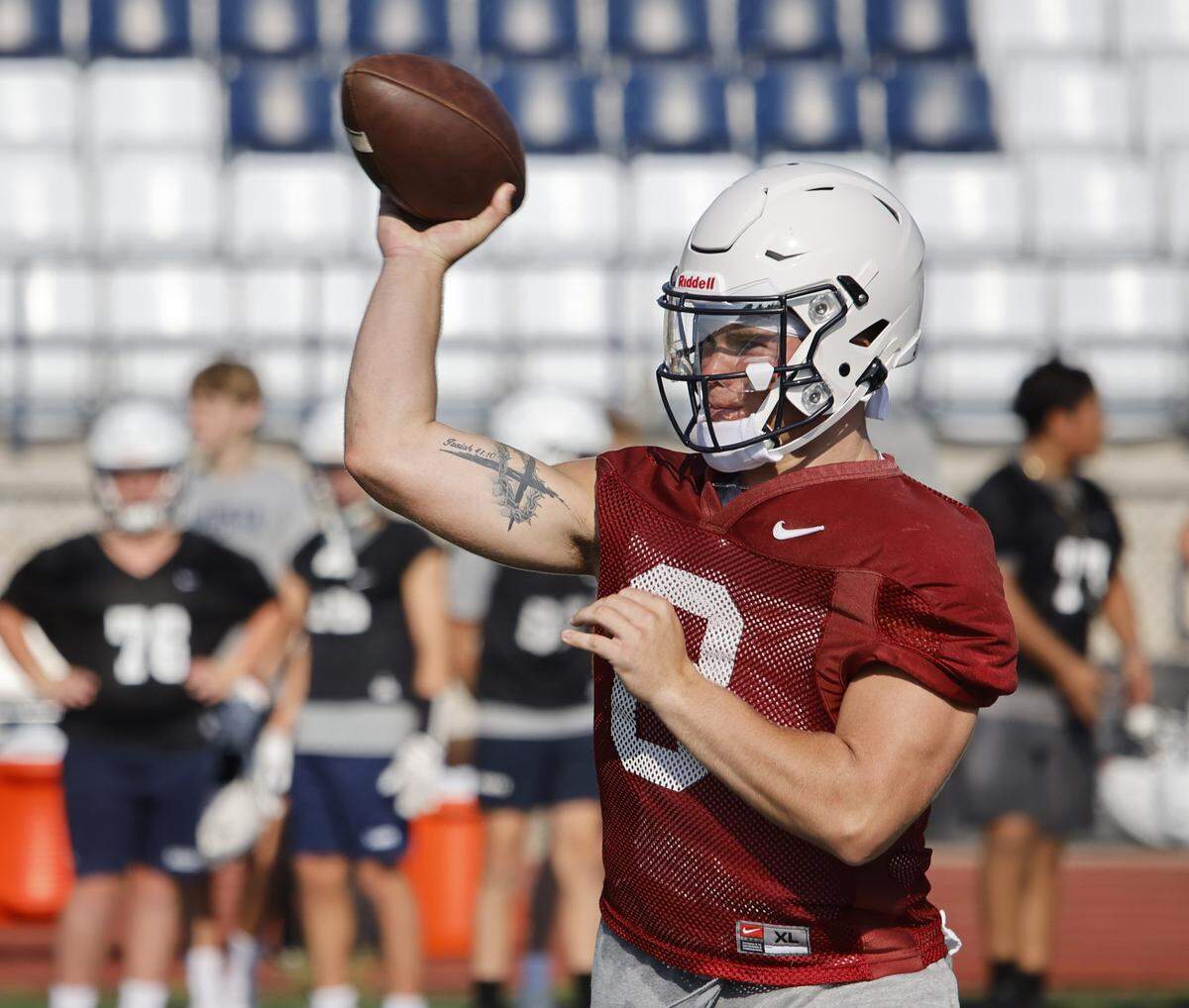 Quarterback Gavin Beard completes a pass downfield during the first practice of 2025 for the All Saints in Fort Worth, Texas, Tuesday August, 05, 2025.
