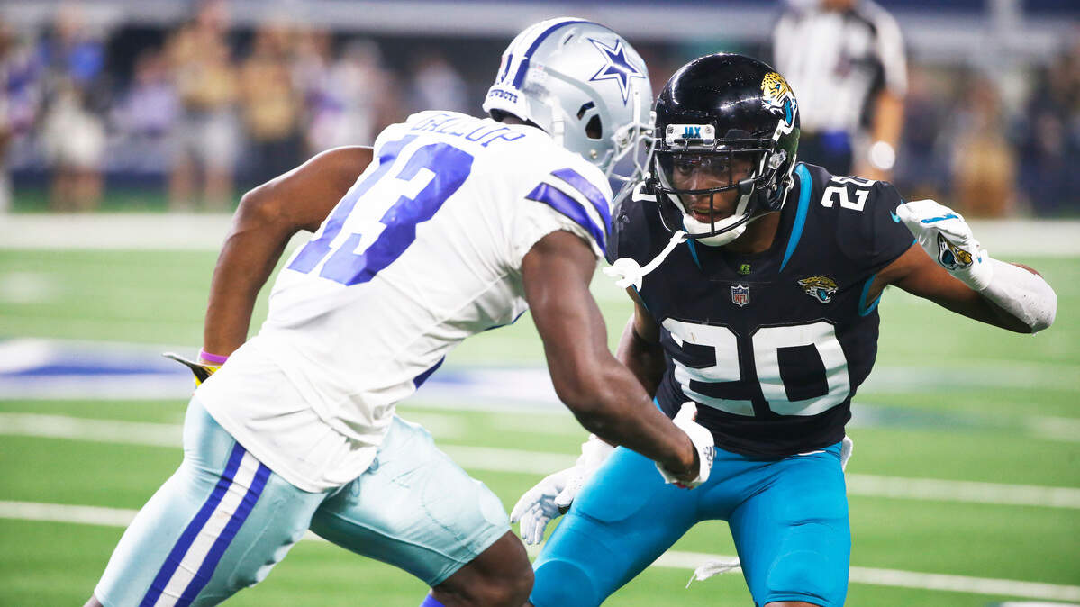 Jacksonville Jaguars cornerback Jalen Ramsey (20) defends against Dallas Cowboys wide receiver Michael Gallup (13) in the second half of an NFL football game in Arlington, Texas, Sunday, Oct. 14, 2018. Dallas won 40-7.
