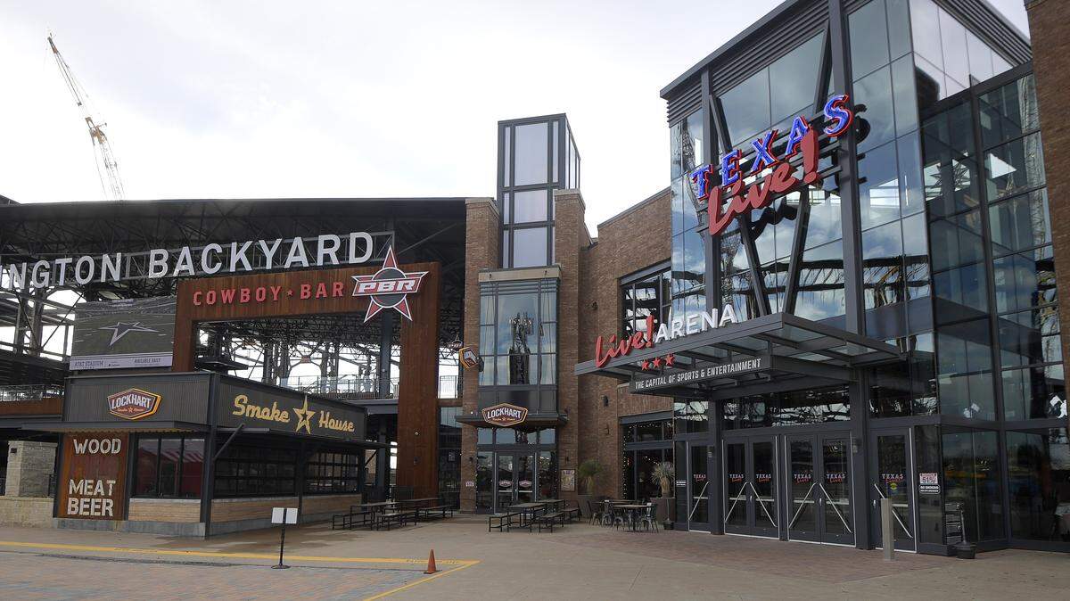 About 30 protesters gathered in Arlington on Sunday to protest a Disney Drag Brunch event happening at Texas Live!