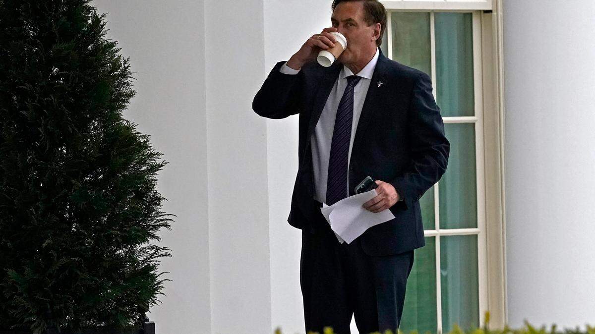 Michael Lindell, CEO of My Pillow, Inc., waits to go into the West Wing of the White House, Friday, Jan. 15, 2021, in Washington.