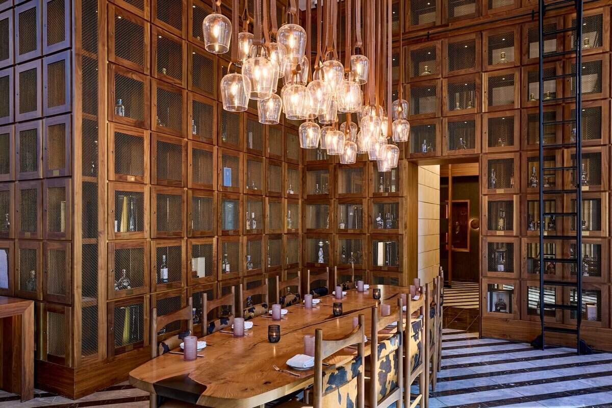 One of Toro Toro’s stunning dining areas that highlights the essence of Fort Worth through the textures of cowhide and wood as well as western art.