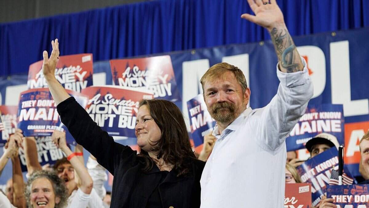 BLUE HILL, MAINE - JUNE 9: Democratic U.S. Senate candidate Graham Platner and his wife Amy Gertner wave to supporters as they arrive to Platner's Primary Election event on June 9, 2026 in Blue Hill, Maine. Platner is the presumptive Democratic nominee and will face incumbent Sen. Collins (R-ME) for Maine's U.S. Senate seat in the general election. (Photo by CJ Gunther/Getty Images)