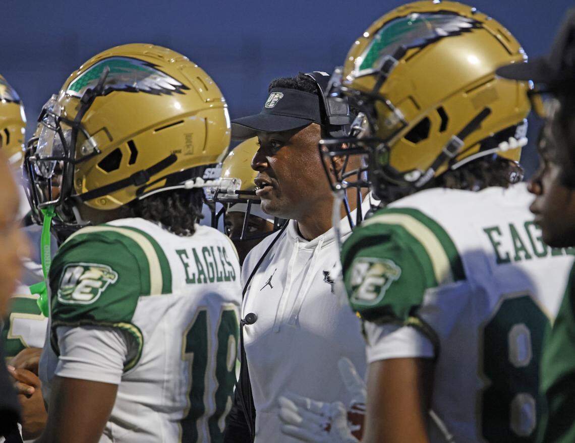 DeSoto head coach Claude Mathis listens in during a time out during the first half of a UIL football game between DeSoto and North Crowley at Crowley ISD Multi-Purpose Stadium in Fort Worth, Texas, Friday, Sept. 05, 2025.