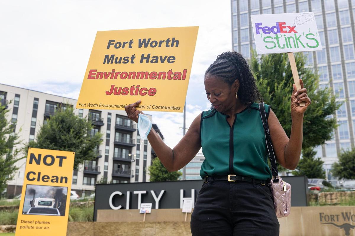 Latitia Wilbourn, an Echo Heights resident, protests in support of the Echo Heights neighborhood outside of the City Hall building in downtown Fort Worth on Tuesday, June 10, 2025. FedEx applied for a permit to allow parking of semi-trucks and trailers in a part of the Echo Heights neighborhood, prompting a protest by the Fort Worth Environmental Coalition of Communities—a group of residents fighting environmental racism—urging the city to deny the permit.
