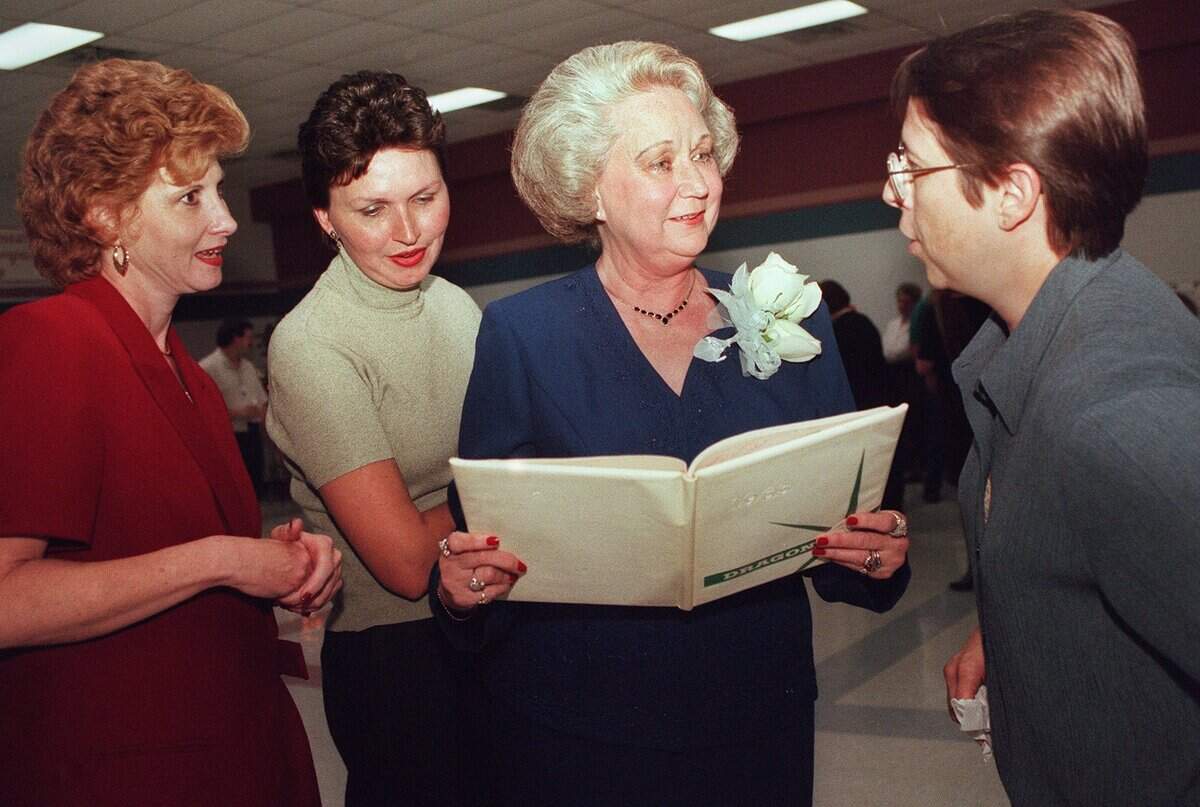 Oct. 28, 1999: Retiring Cannon Elementary School teacher Billie Ebersole, middle, reminisces with three of her first students from Carroll Elementary School in Southlake, Susan Hays from San Antonio, left, Donna Hodges from Grapevine, and Carol Pye from Louisville, Kentucky.