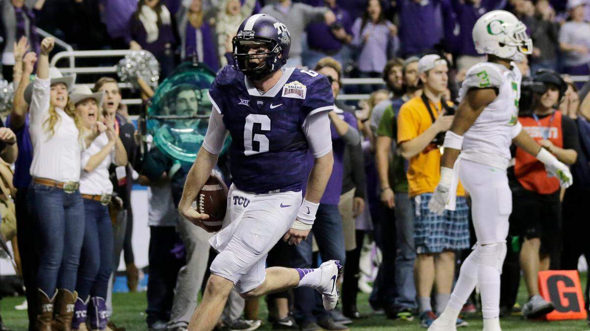 TCU quarterback Bram Kohlhausen (6) runs for a touchdown against Oregon during the third overtime of the Alamo Bowl NCAA college football game, Saturday, Jan. 2, 2016, in San Antonio. TCU won 47-41 in triple overtime.