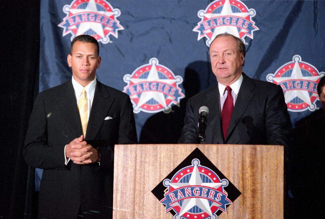 12 Dec 2000: Alex Rodriguez stands with Owner Tom Hicks during a press conference after being signed to the Texas Rangers at The Ball Park in Arlington, Texas.Mandatory Credit: Gary Barber /Allsport