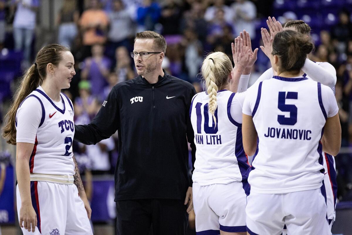 TCU Head Coach Mark Campbell speaks with his team during a timeout in the second half of an NCAA game between TCU and Houston at Schollmaier Arena in Fort Worth on Wednesday, Feb. 26, 2025.