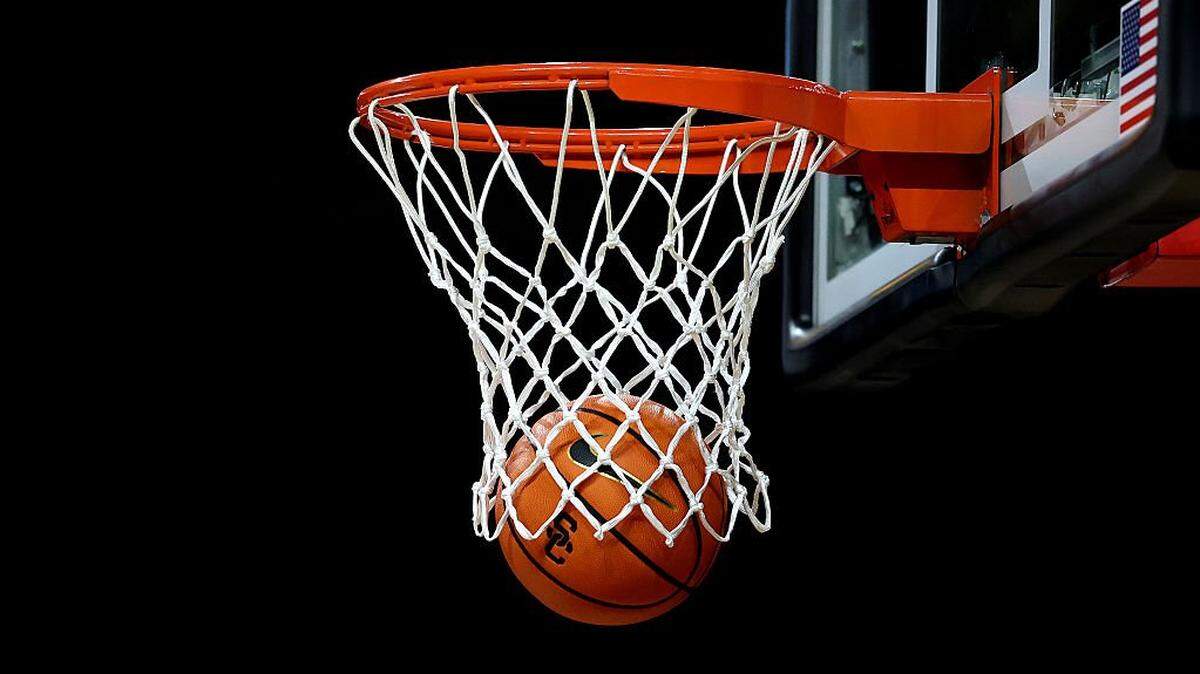 LOS ANGELES, CALIFORNIA - JANUARY 15: A USC Trojans branded basketball passes through the hoop before the game between the USC Trojans and the Maryland Terrapins at Galen Center on January 15, 2026 in Los Angeles, California. (Photo by Luke Hales/Getty Images)