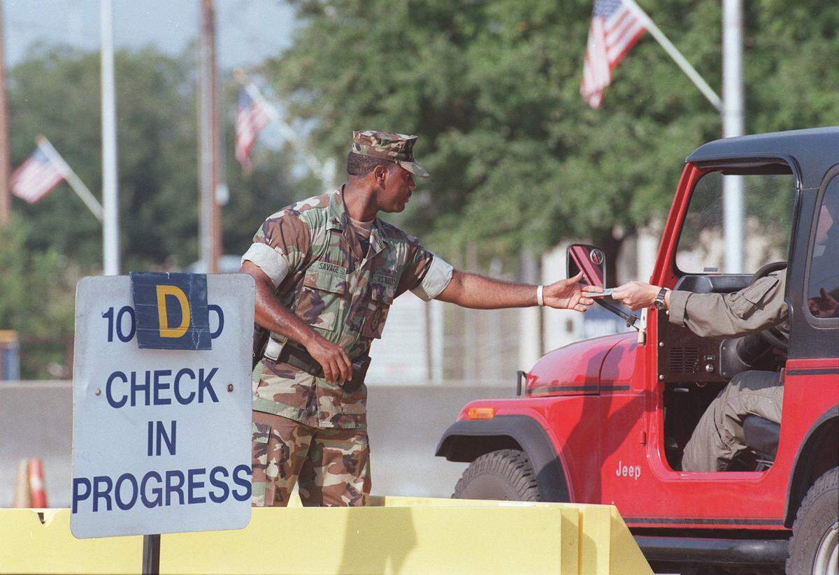 IDs are checked at the gate of Naval Air Station Joint Reserve Base Fort Worth, under a security alert on Sept. 11.