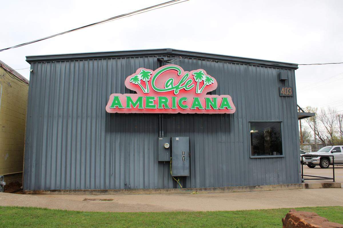 Front of the new Cafe Americana restaurant located on 403 E Main St, Arlington, TX 76010. The outside does no justice for the beautifully decorated interior.