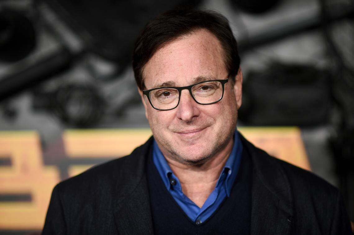 FILE - Bob Saget arrives at a screening of “MacGruber” on Dec. 8, 2021, in Los Angeles. Saget’s family has released a statement on the cause of his death last month in Florida, citing authorities saying the actor-comedian died from an accidental blow to the head. (Photo by Richard Shotwell/Invision/AP, File)