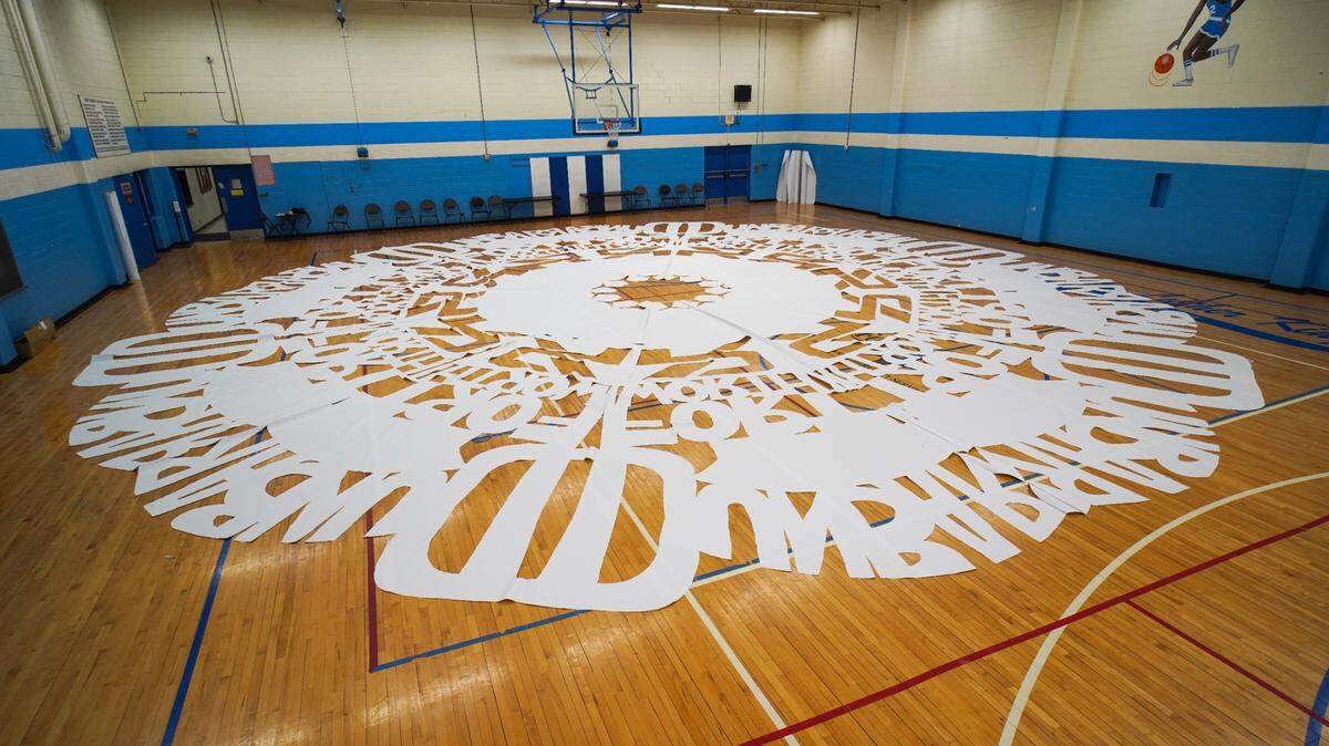 The “It’s Bigger in Fort Worth” large paper snowflake created by Dunbar High School art students.
