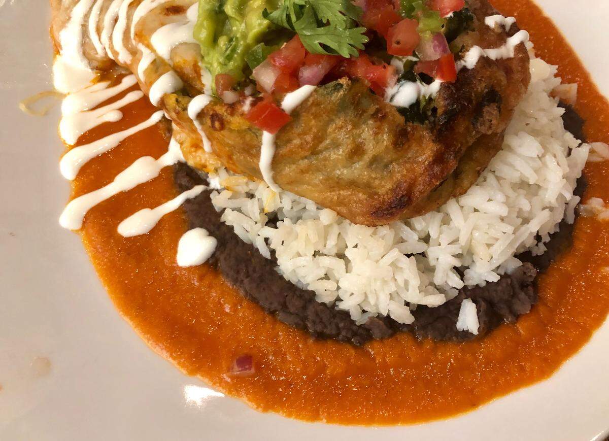 A goat-cheese chile relleno on tomato-habanero salsa is a feature at El Bolero.