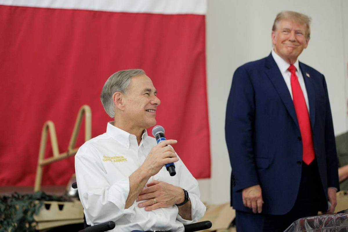 Gov. Greg Abbott gives remarks with former President Donald Trump in Nov. 2023 at the South Texas International airport in Edinburg, Texas. 