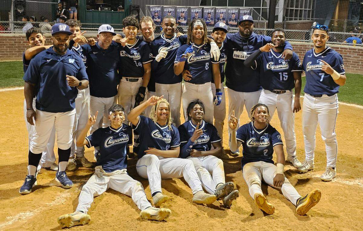 The Fort Worth O.D. Wyatt baseball team poses at home plate after ending a 52-year playoff drought with a 10-0, 5-inning win over Fort Worth South Hills on Friday, April 19, 2024 at Wyatt High School in Fort Worth, Texas.