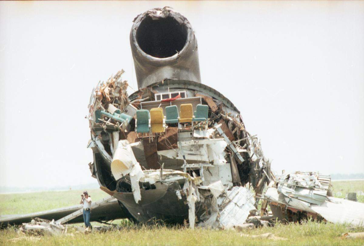 Seats can be seen in a section of the plane that was ripped in half.