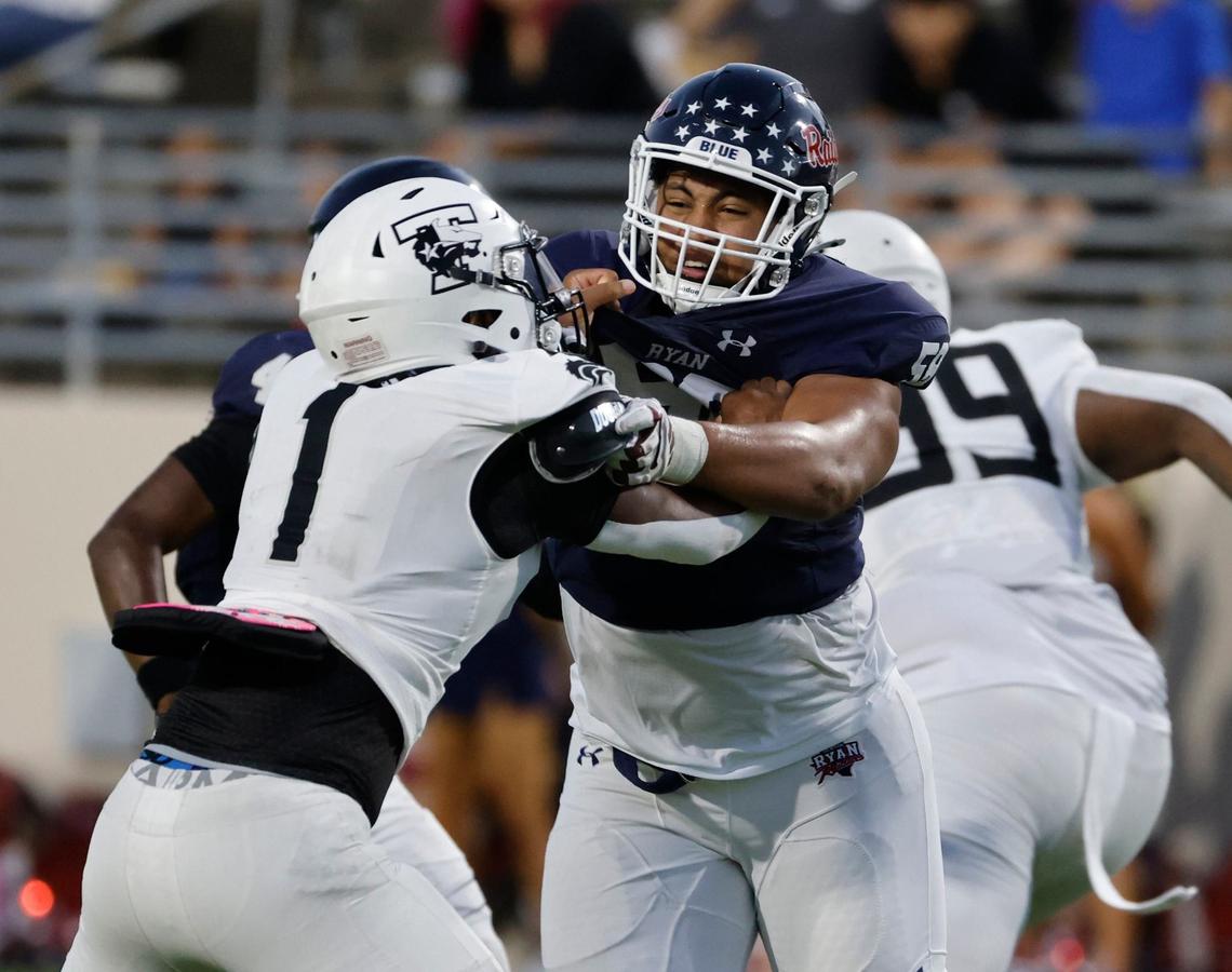 Denton Ryan offensive lineman Ty Haywood (70) blocks Timberview linebacker Caden Bates (1) during a UIL football game at C.H. Collins Activity Complex in Denton, Texas, Thursday, Sept. 05, 2024.