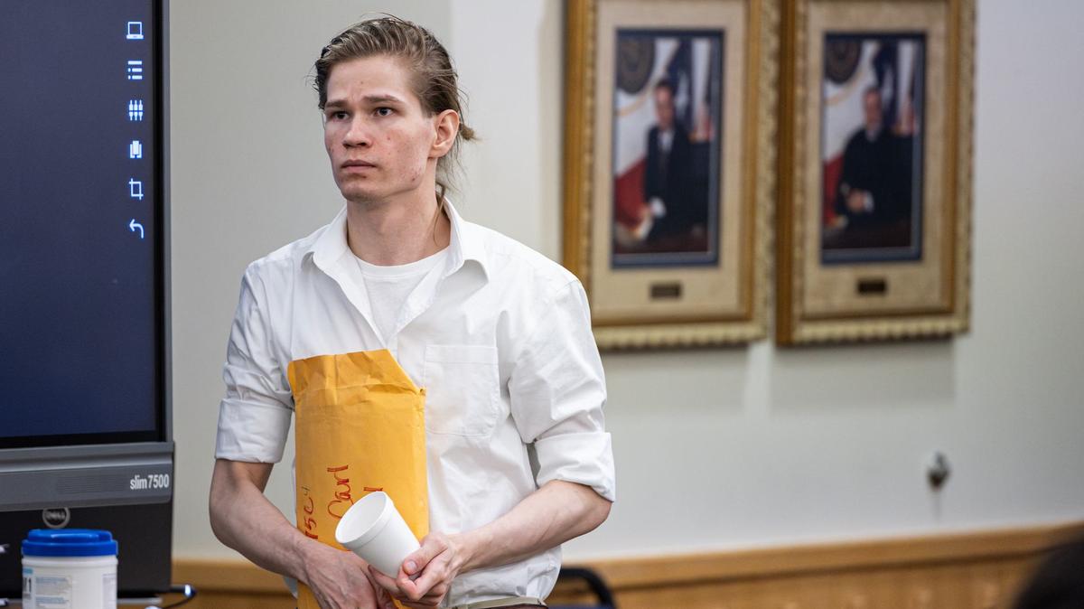 Defendant Carl Brewer, 25, enters the courtroom for his capital murder trial at the Tim Curry Criminal Justice Center in Fort Worth on Wednesday. He is accused of shooting to death his adoptive parents, Troy Brewer and Mary Brewer, in November 2016 in Crowley.