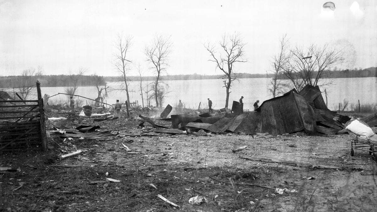 A 1944 explosion at the Pan-American Fireworks Co. on Lake Worth killed five and injured six. This picture shows the wreckage of the “punching house,” one of the first buildings destroyed. Ambulance attendants and firemen are searching the debris.