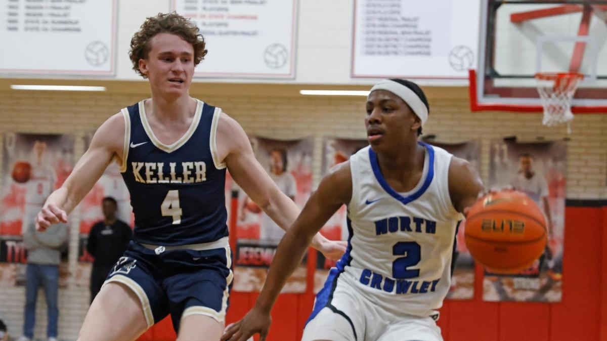 North Crowley guard Kameron Price pulls up against Keller guard Parker Viers during the second half of a playoff game at Martin High School in Arlington, Monday, Feb. 17, 2025.