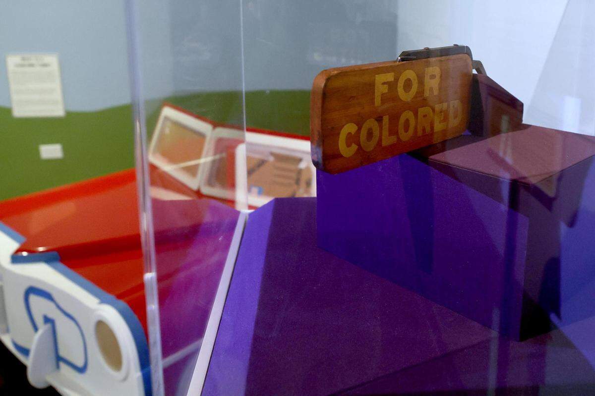 A wooden sign used on Fort Worth trolleys during segregation is part of the Fort Worth Museum of Science and History exhibit ‘Fort Worth and the Green Book.’