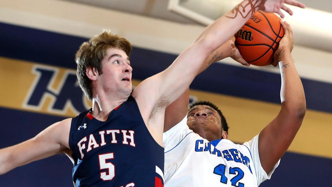 Grapevine Faith’s Luke Stiefel (5) blocks the shot of Dallas Christian post Jaiden Jones (42) during the TAPPS 5A regional basketball playoff game at Grace Prep in Arlington, Texas, Saturday, March 06, 2021. Grapevine Faith defeated Dallas Christian 52-48. (Special to the Star-Telegram Bob Booth)