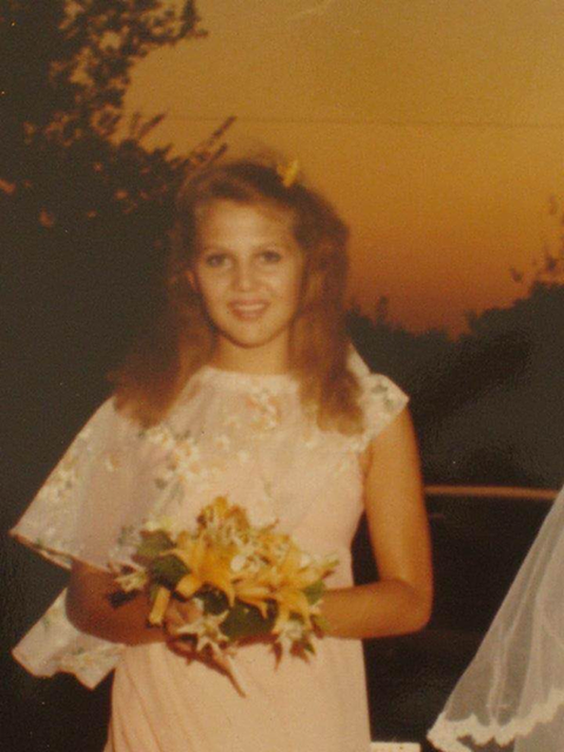 Megan Johns served as maid of honor in Kelly Chance’s wedding. Chance now works to bring attention to Megan’s case.