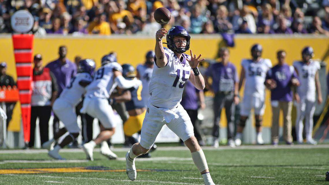 TCU quarterback Max Duggan (15) passes against West Virginia during the first half of an NCAA college football game in Morgantown, W.Va., on Saturday.