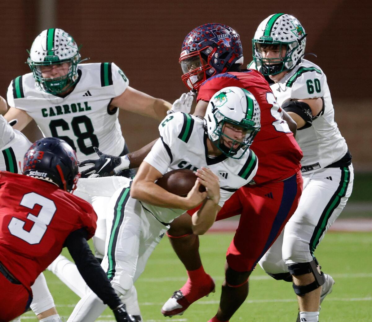 Southlake quarterback Angelo Renda (2) takes the ball for a gain during a District 4 6A football game at Northwest ISD Stadium in Justin, Texas, Thursday, Oct. 17, 2024.