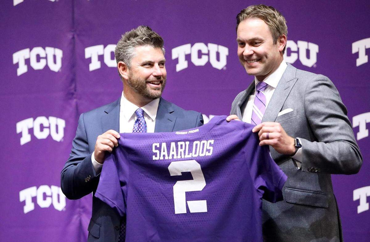 TCU athletic director Jeremiah Donati, right, announces Kirk Saarloos as the new baseball coach on Tuesday, June 15, 2021. Saarloos is replacing Jim Schlossnagle who is left for Texas A&M.
