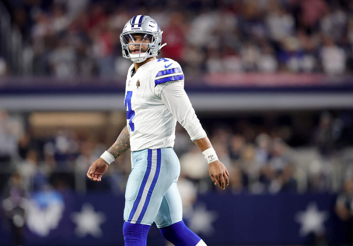 Dallas Cowboys quarterback Dak Prescott leaves the field after throwing an interception during the fourth quarter against the Tampa Bay Buccaneers on Thursday, Oct. 8, 2026, at AT&T Stadium in Arlington.