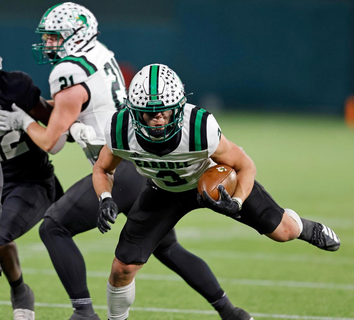 Southlake Carroll’s Owen Allen (2) breaks out of the left side during a Conference 6A Division 1 regional playoff football game at Globe Life Park in Arlington, Texas, Friday, Dec. 24, 2020. Southlake Carroll defeated Arlington Martin 30-26. (Special to the Star-Telegram Bob Booth)