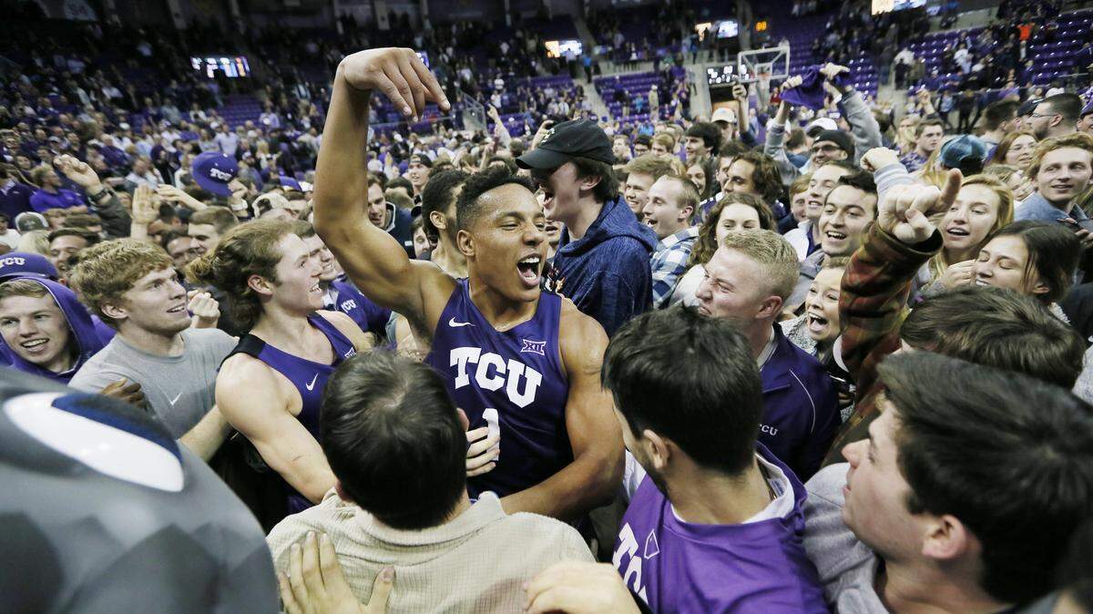 TCU guard Desmond Bane celebrates with fans after the Horned Frogs beat No. 7 West Virginia 82-73 at Schollmaier Arena on Jan. 22. It was the first win ever against the Mountaineers and first win over a ranked team at home since 2015.