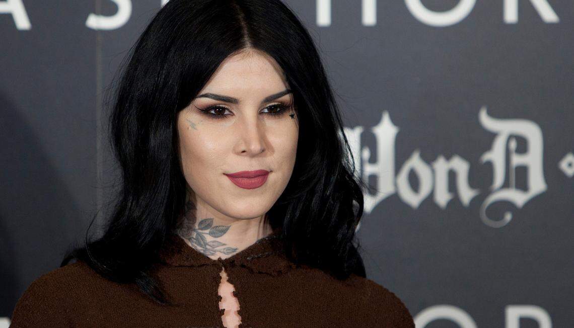 US tattoo artist Kat Von D poses for photographers during the presentation of her new line of makeup in Madrid, Spain, Wednesday, Oct. 7, 2015. (AP Photo/Abraham Caro Marin)