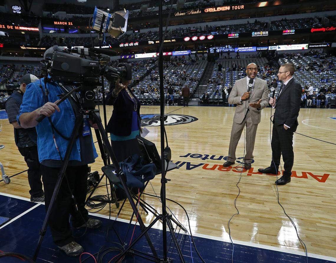 Former Dallas Maverick Derek Harper, during pre-game broadcasting duties with Mark Followill (r) before the Golden State Warriors play the Dallas Mavericks in Dallas, Wednesday, January 3, 2018, will have his jersey retired by the Mavs.